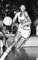 Dean Tolson left Arkansas with career scoring and rebounding averages of 18.3 and 11.7 -- the latter of which remains the school record. After a brief professional career, Tolson returned to Arkansas in 1987 to complete his degree. Graduating from college was especially noteworthy for Tolson, because he was illiterate while attending UA.