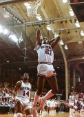 During a trip to rival Texas. Alvin Robertson, pictured above, recorded the school's first triple-double in a four-point win over the Longhorns. Robertson tallied 23 points, 10 assists and 11 rebounds. Later, in the NBA, Robertson became one of only four players -- and the only non-center -- to record a quadruple-double.