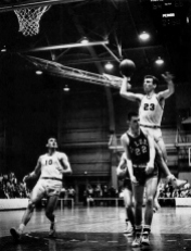 Despite a disappointing 5th place finish in 1957, Arkansas rebounded to win a share of the SWC in 1958. The Hogs secured a spot in the NCAA Tournament -- which had expanded to 24 teams -- by beating SMU in a playoff game.
