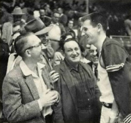 Arkansas guard Fred Grim chats with fans after a game in Barnhill Fieldhouse during the 1956 season. Grim, who played for the Hogs from 1956-1958, was named first team All-SWC and honorable mention All-American in 1958.