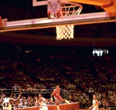 Arkansas’ last-second win over Louisville in the 1981 tournament endures more than three decades later. Often listed among top 10 lists of classic NCAA Tournament endings, U.S. Reed’s half-court buzzer-beater sent the Hogs to their third Sweet 16 and knocked out the defending champions. Arkansas inbounded the ball under its own goal and Reed dribbled frantically to mid-court, hounded by two Cardinals defenders. Reed launched a 49-foot bomb with one tick left on the clock and the buzzer sounded while the ball sailed toward the rafters. After emphatically splashing through the hoop, a contingent of Razorbacks fans, players, coaches and cheerleaders swarmed the court.