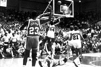 Playing without a shot clock in those days, Arkansas forced North Carolina to play at a slower place. But the Tar Heels overcame a 10-point deficit in the second half and took a 64-63 lead after two consecutive baskets from Jordan. With nine seconds left, Alvin Robertson tried a jump shot but passed at the last second to Charles Balentine, who snagged the ball before it went out of bounds and flipped it into the hoop. North Carolina called a timeout but its last-second heave rimmed out and fans stormed the court.