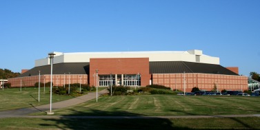 The 1993-94 season unveiled a new home for the Hogs -- their first since moving to Barnhill Arena in the 1950s. Bud Walton Arena was built south of Barnhill and Razorback Stadium, but still on campus. BWA was everything Barnhill wasn't: luxurious, spacious and ritzy. It has since been christened the Basketball Palace of Mid-America. Before leaving Barnhill, former Hogwild band director Jim Robken helped capture the "Spirit of Barnhill" in a crystal bowl that was late placed in the lobby of Bud Walton Arena.