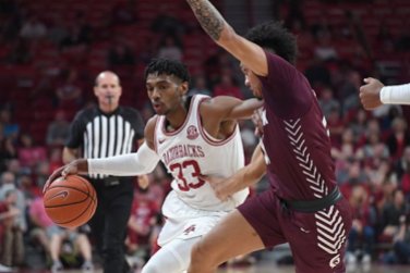 The Hogs marked another milestone on the same night they honored Coach Richardson: hosting UALR for an exhibition game. It was the first meeting between the two in-state schools.